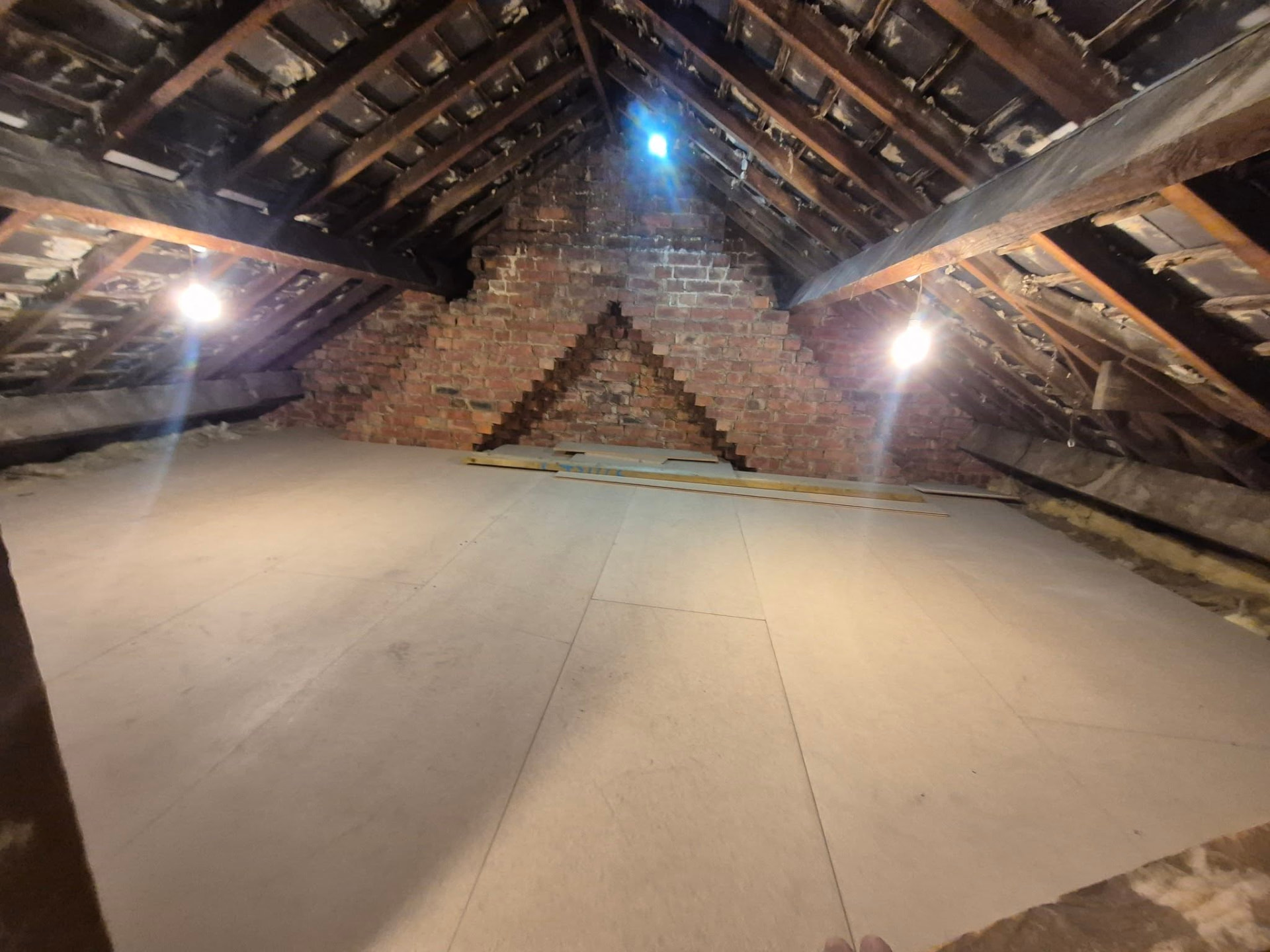 Spacious loft area with professionally installed boarding
